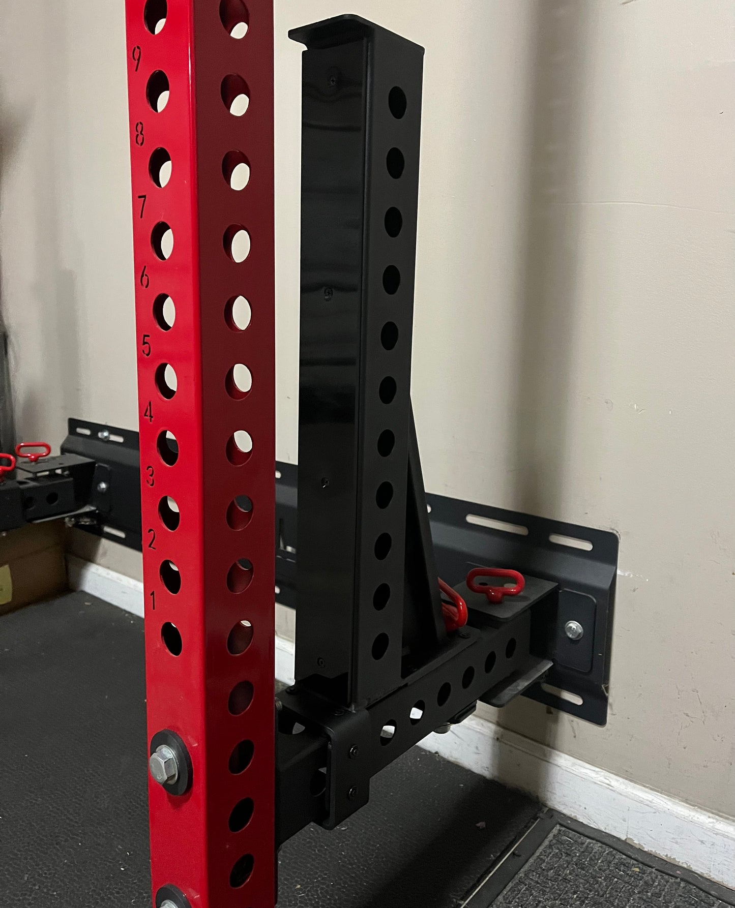RIVAL STEEL Foldable Wall-Mounted Squat Rack